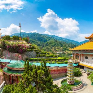 Malaysia tour package featuring Kek Lok Si Temple in Penang with colorful Buddhist architecture and scenic mountain views.